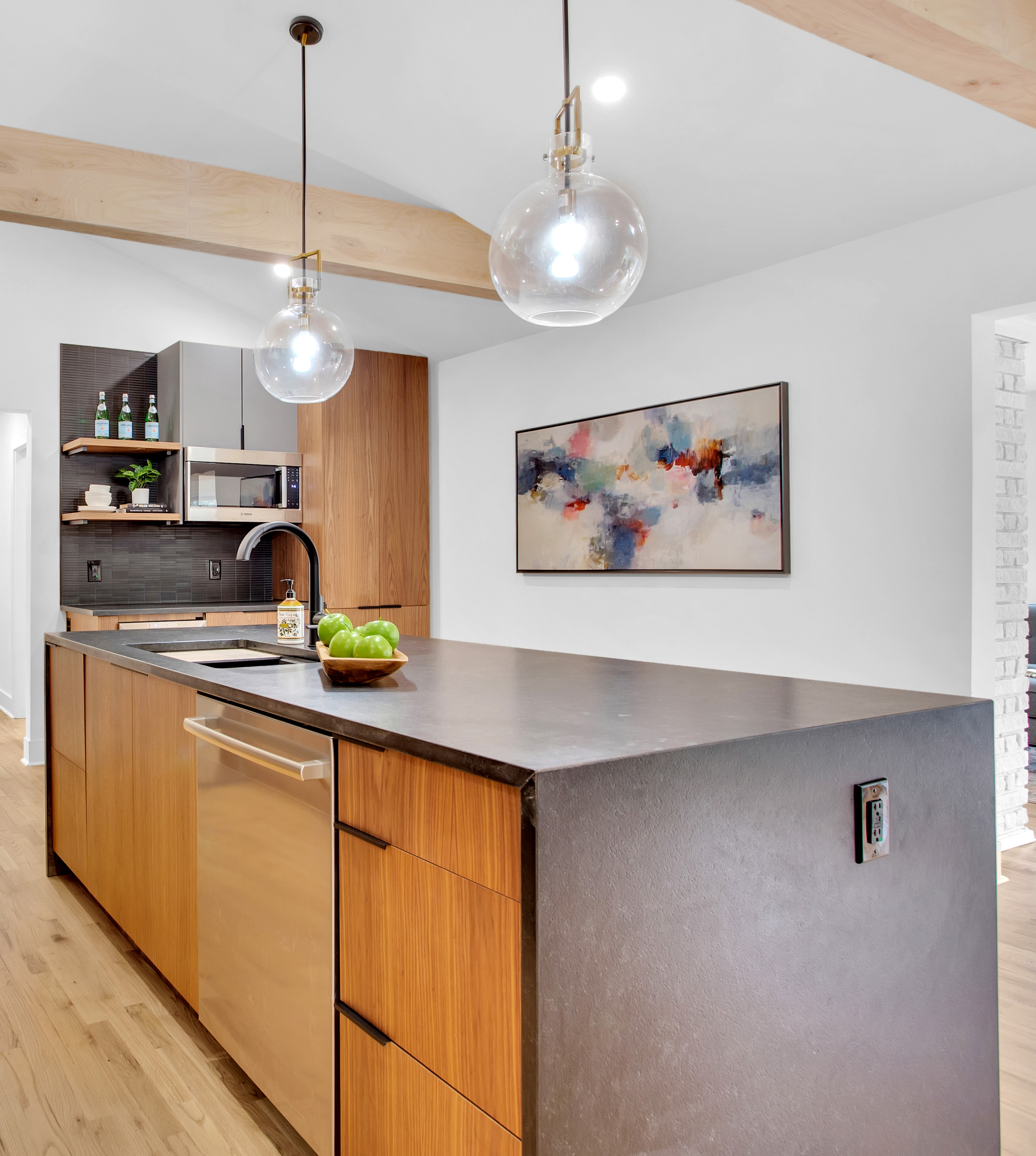 mid-century modern kitchen with waterfall countertop